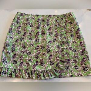 Tory Burch Ruffle Twill Skirt in Green Scribble Floral - built in mesh shorts